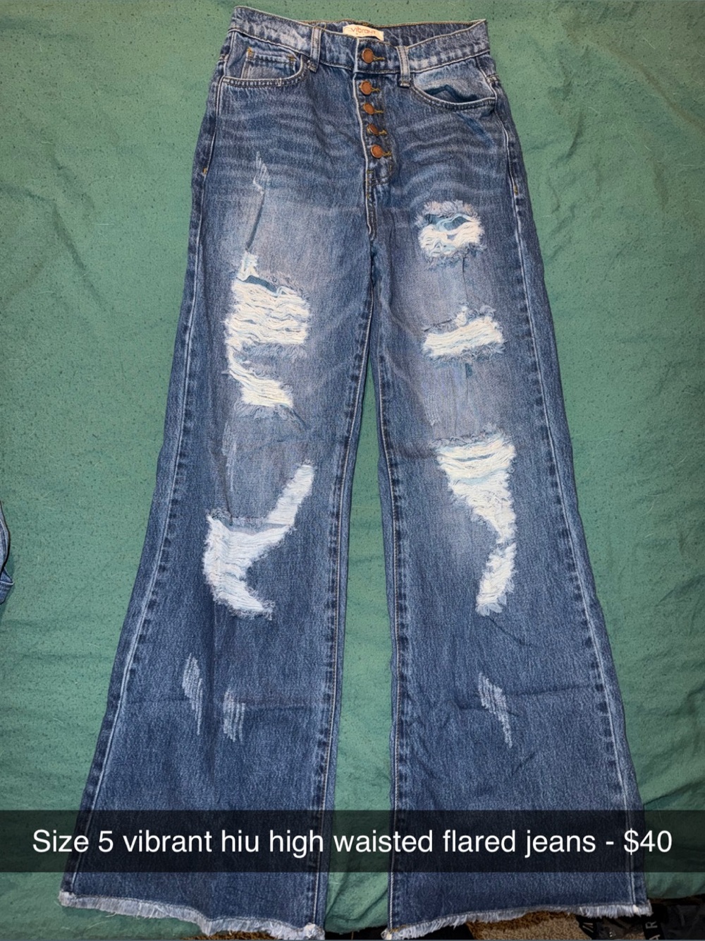 Vibrant Distressed High-Rise Flare Jeans in Blue